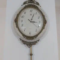 ساعت دیواری آونگ دار