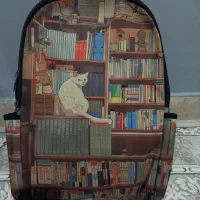 کوله پشتی طرح کتاب و گربه
