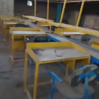خط مونتاژ ۱۲ متری با ۱۲ عدد میز و ۱۲ عدد صندلی|ماشین‌آلات صنعتی|اشتهارد, |دیوار