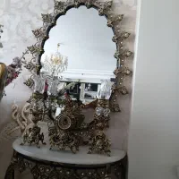 اینه و شمعدان به همراه ساعت
