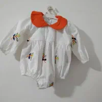 لباس بچه زیر دکمه