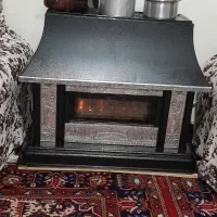 یک عدد بخاری شومینه یک عدد جا کفشی سالنی