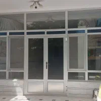 درب آلومینیومی با شیشه دو جداره