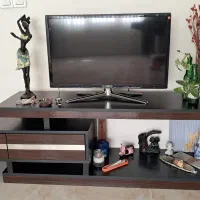 تلویزیون ۳۲ اینچ ایکس ویژن و میز تی وی