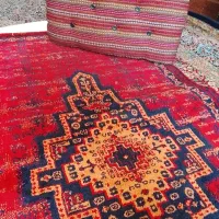 پشتی و قالیچه
