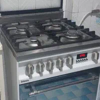 اجاق گاز 4 شعله سینجر کارکرده سالم در حد نو