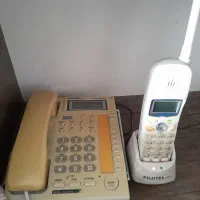 دوعدد تلفن رومیزی و بی سیم