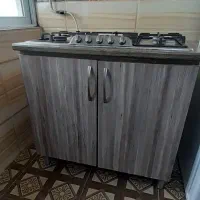 اجاق گاز پنج شعله همراه با کمد کاملا سالم در حد نو