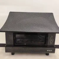 بخاری شومینه و دراور و آینه