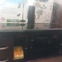 میز شیشه‌ای مخصوص تلویزیون مدل ترک