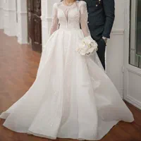 لباس عروس پرکار سنگدوزی شده