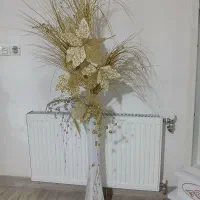 ساعت ایستاده و گل