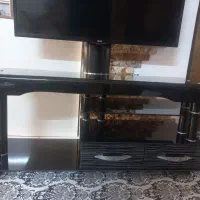 زیر تلویزیونی شیشه ای