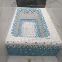 سیمانکاری اسلب و اجرای کاشی کاری استخری