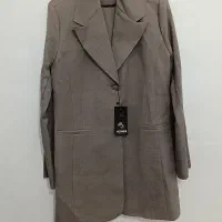 یک عدد  مانتو شلوار رنگ طوسی .سایز ۴۳