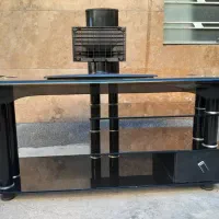 میز شیشه ای تلوزیون در حد نو