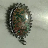 تو گردنی فیروزه و نقره
