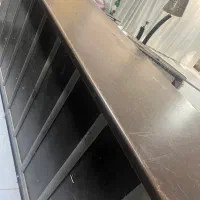 میز ‌‌یشخوان  یا مغازه پارچه فروشی