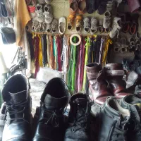 فروش وتعمیر انواع کیف وکفش چرم