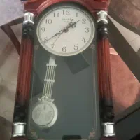 یک عدد ساعت دیواری تمیز وقابل استفاده درحدنو