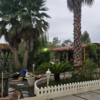 ویلا باغ ۷۰۰ متری محوطه شیک همراه با گل و گیاه