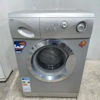 ماشین لباسشویی کارکرده اسنوا۷کیلوضمانت حمل رایگان