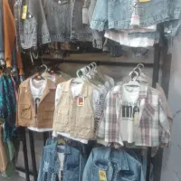 فروش یکجا پوشاک بچگانه