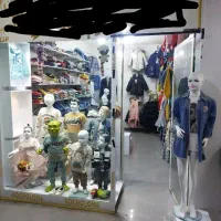 ویترین.پیشخوان.قفسه.راگال.مانکن