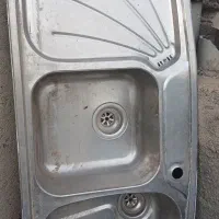 اب چکان و سینک ظرفشویی