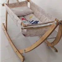 گهواره نوزاد وتخت کنار مادرتوافقی