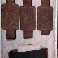 بازو بند و کیف چرمی