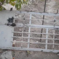 درب اهنی سنگین تقریبا ۹۰ کیلو