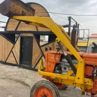 خدمات با تراکتور بیل جلو