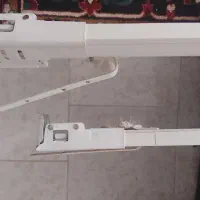 کتیبه و چوب پرده اتوماتیک