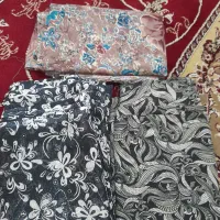 تعدادی پارچه ولباس