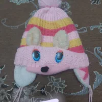 لباس و کلاه بچگانه