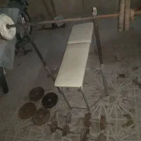 لوازم ورزشی میله هالتر وزنه میز پرس سینه کفش گشتی