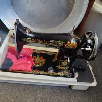 یک عددتلویزیون وچرخ خیاطی