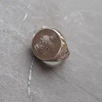 انگشتر تاج و شیر خورشید