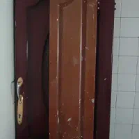 درب چوبی ۲ لنگه همراه با دستگیره سالم