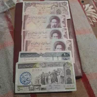 تعدادی اسکناس 10 تومانی