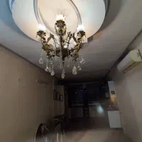 لوستروساعت و دیوارکوب تمام برنز