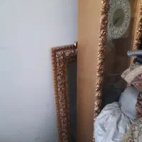 آیینه وکنسول وساعت ایستاده