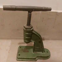 دستگاه پرس دکمه