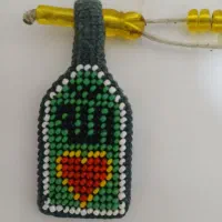 تسبیح رنگ قناری دانه ریز و جا فندک بافته شده