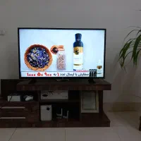 تلویزیون ۴۹ اینچ ال‌جی با میز تلویزیون