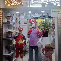 ویترین  دکور مغازه و مانکن و ال ای دی رگال