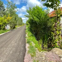 ۲۵۰متر زمین مسکونی با سند تکبرگ بر اسفالت تاپ