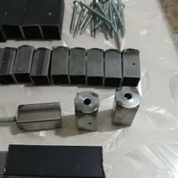 بست فلزی جهت اتصال قفسه به دیوار