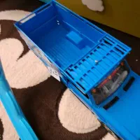 یک پیکان ونیسان و چرخو فلک کمر